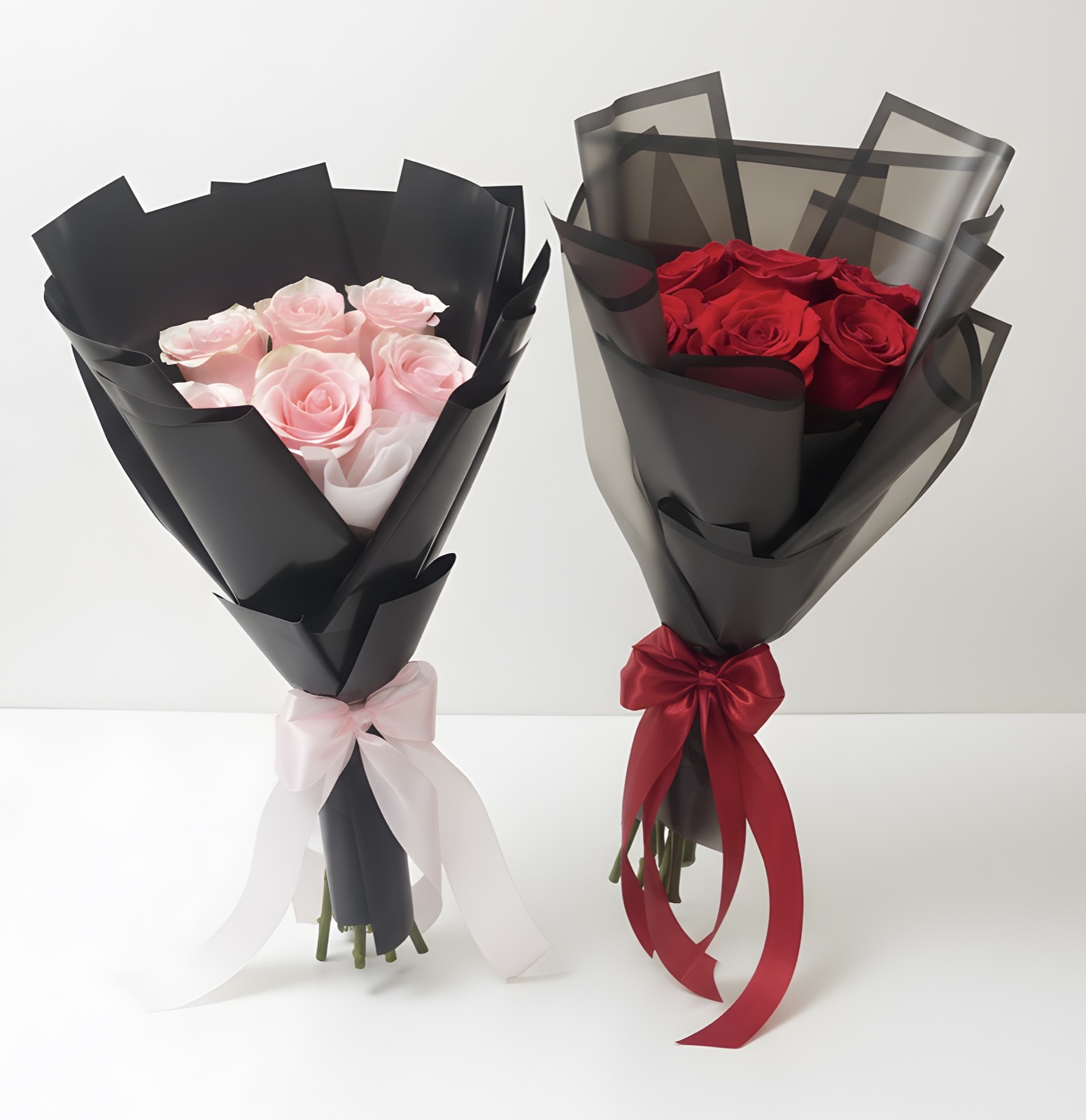 Separate pink and red six-rose bouquets